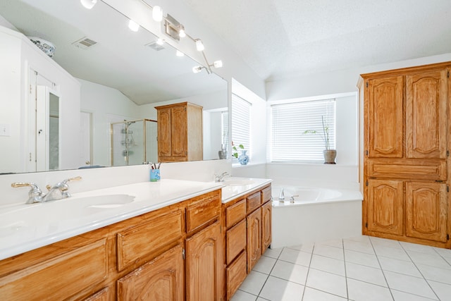 bathroom with tile patterned flooring and an enclosed shower