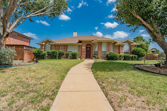 ranch-style house with a front yard