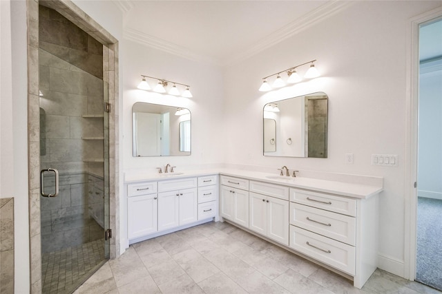 bathroom with crown molding, vanity, and walk in shower