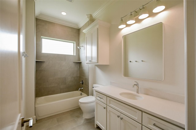 full bathroom with tiled shower / bath combo, vanity, toilet, crown molding, and tile patterned floors