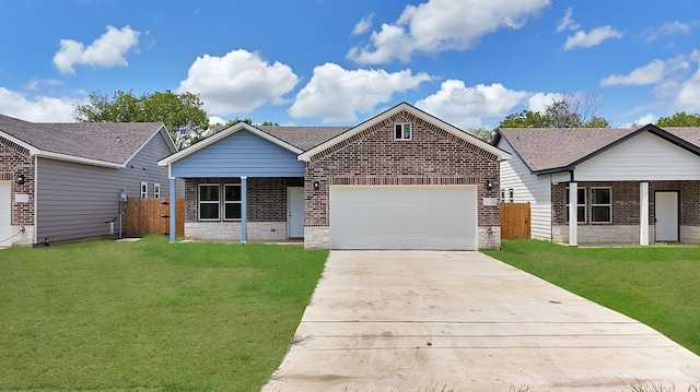 single story home featuring a garage and a front lawn