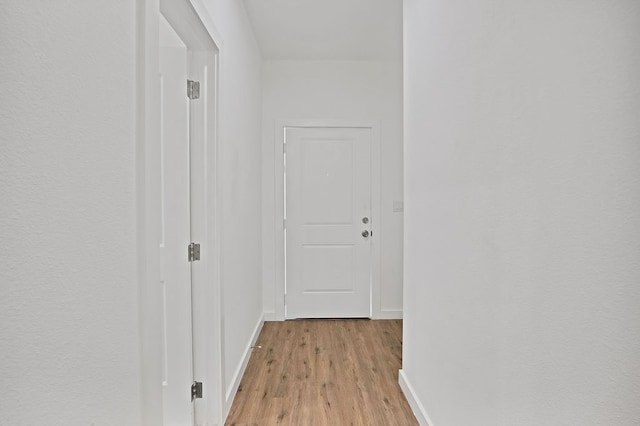 hall featuring light wood-type flooring