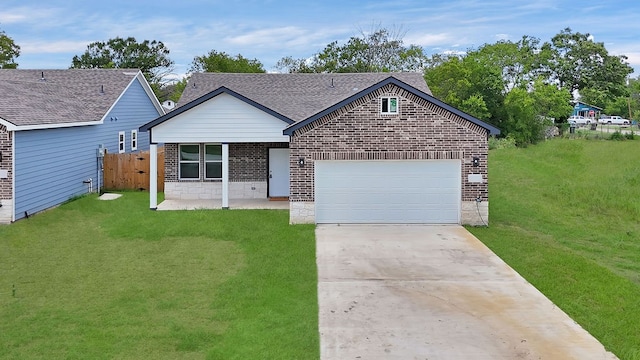 single story home with a garage and a front yard