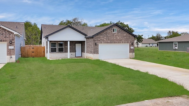 ranch-style home featuring a garage and a front yard