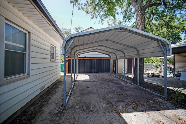 view of car parking with a carport