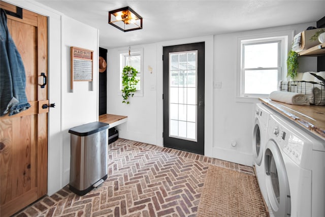 laundry area with washer and clothes dryer