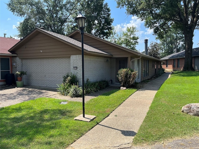 view of property exterior with a garage and a lawn