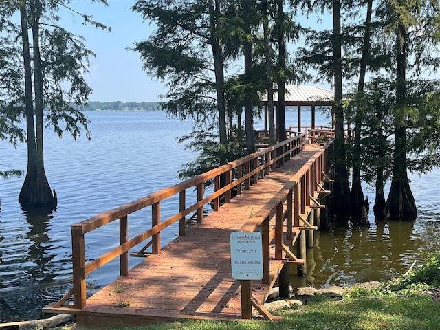 view of dock with a water view