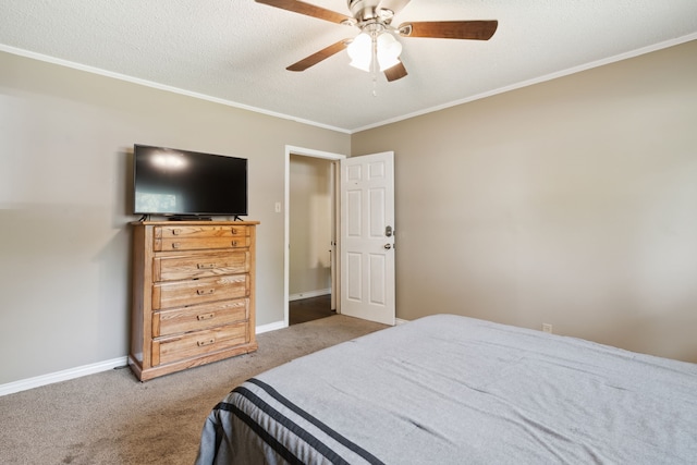 bedroom with ornamental molding, carpet flooring, a textured ceiling, and ceiling fan