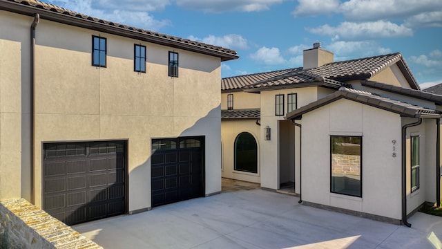 exterior space with a garage