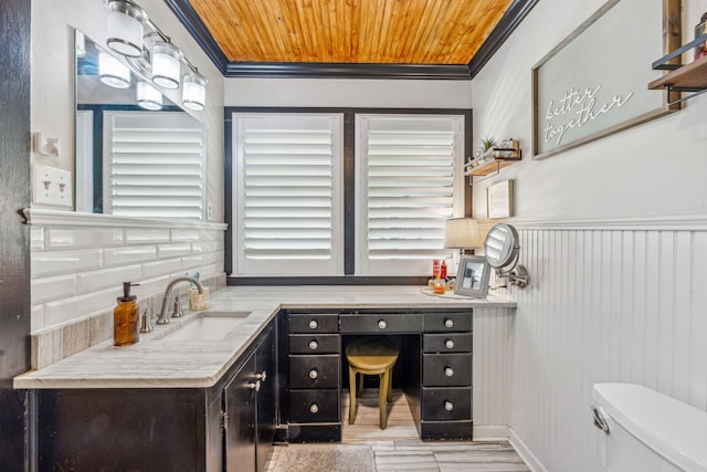 bathroom with vanity, crown molding, wooden ceiling, and toilet