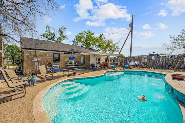 view of pool with a patio area