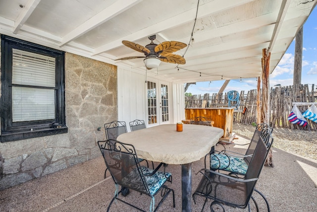 view of patio featuring ceiling fan