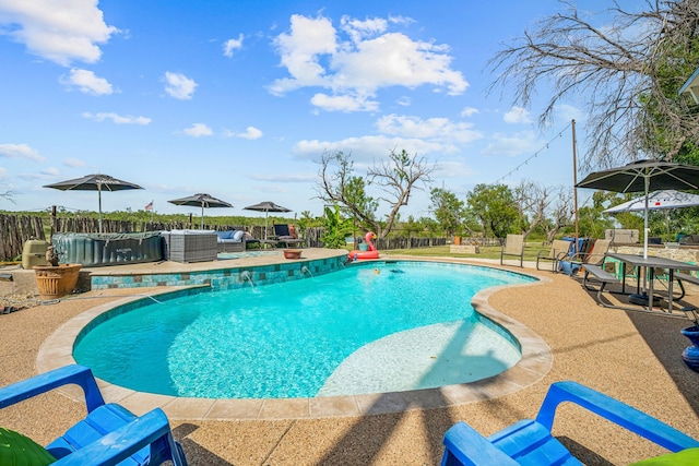 view of swimming pool featuring a patio and pool water feature