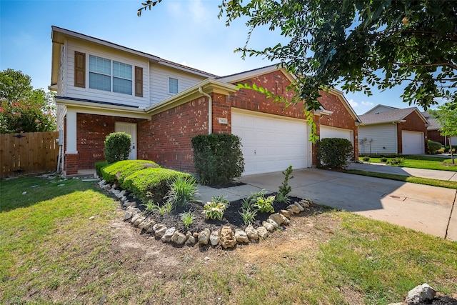 view of front of house with a garage and a front yard