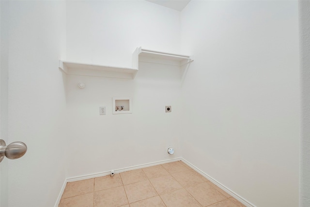 washroom with hookup for a gas dryer, baseboards, hookup for a washing machine, and laundry area