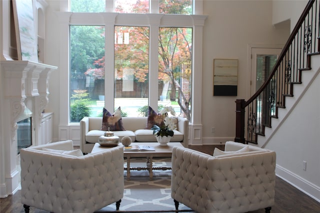 living room with hardwood / wood-style floors and plenty of natural light