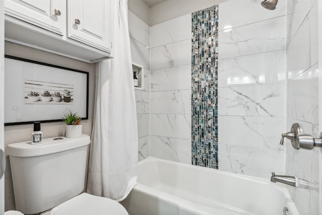 bathroom featuring toilet and shower / bath combination with curtain