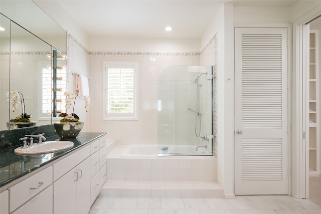 bathroom with tile patterned floors and vanity