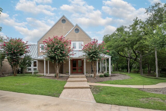 view of front facade with a porch and a front yard