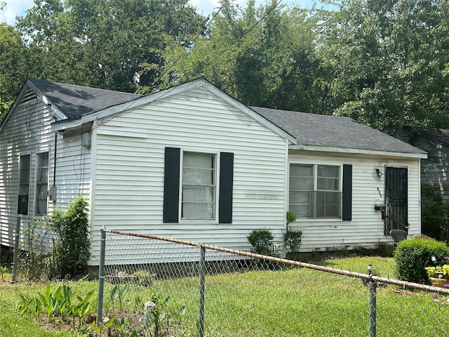 exterior space with a lawn