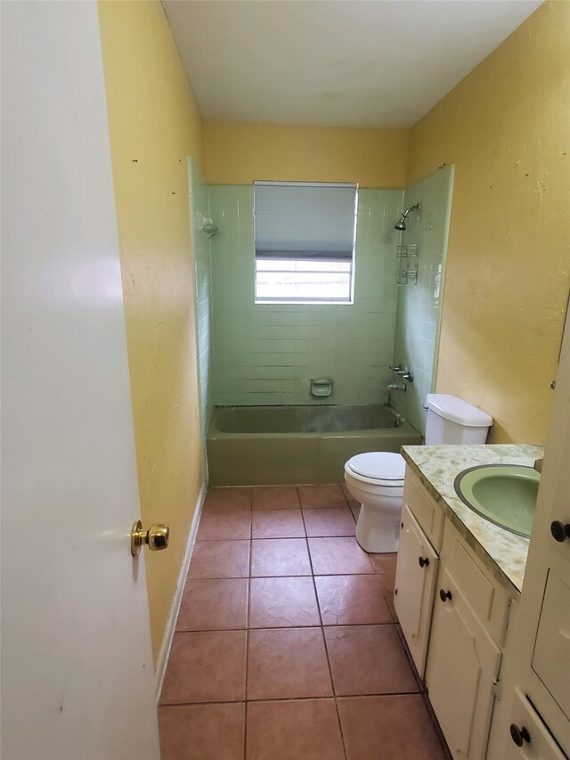 full bathroom featuring vanity, baseboards, shower / tub combination, tile patterned floors, and toilet