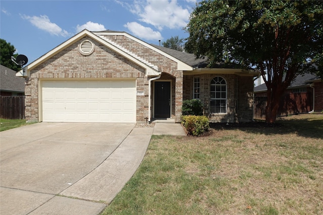 ranch-style home with a garage and a front lawn