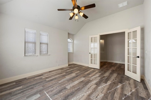 spare room featuring ceiling fan, plenty of natural light, lofted ceiling, and french doors