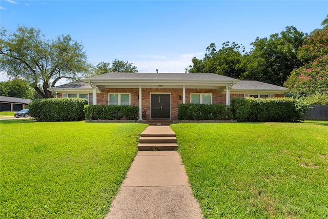 ranch-style house with a front yard