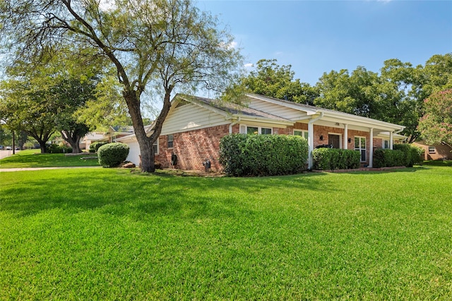 view of side of home featuring a lawn