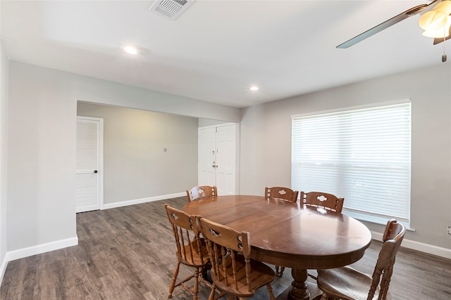 dining area featuring dark hardwood / wood-style flooring and ceiling fan