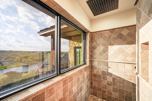 bathroom featuring a water view