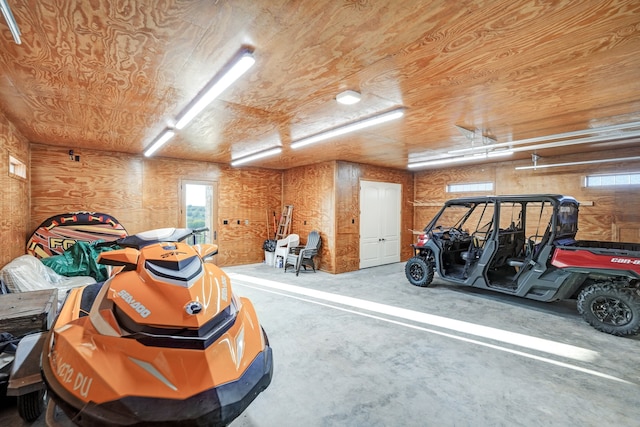 garage with wood walls