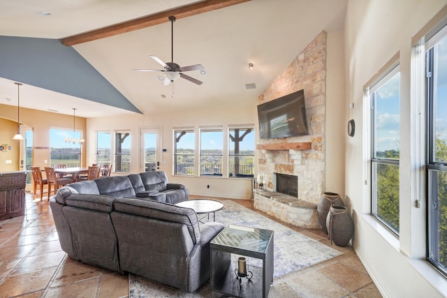 living room with beam ceiling, a fireplace, ceiling fan, high vaulted ceiling, and baseboards