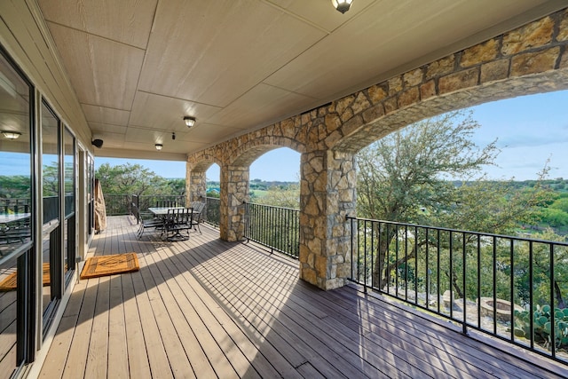 deck featuring outdoor dining area