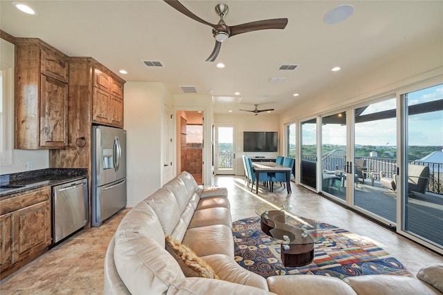 living room with ceiling fan