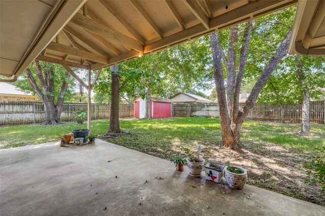 view of patio / terrace featuring a shed