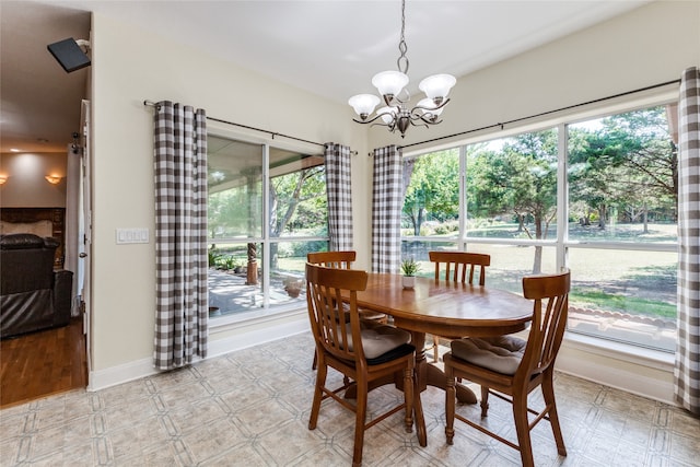 dining room with a notable chandelier