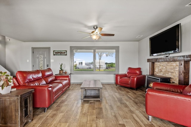 1320 Murrah Ln, Kaufman, TX 75142 - living room featuring light wood finished floors and ceiling fan