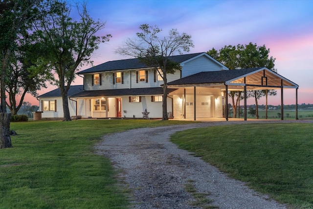 1320 Murrah Ln, Kaufman, TX 75142 - view of front of home with curved driveway, a front lawn, and a shingled roof