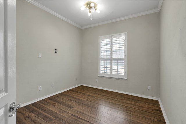 unfurnished room with dark wood-type flooring and ornamental molding