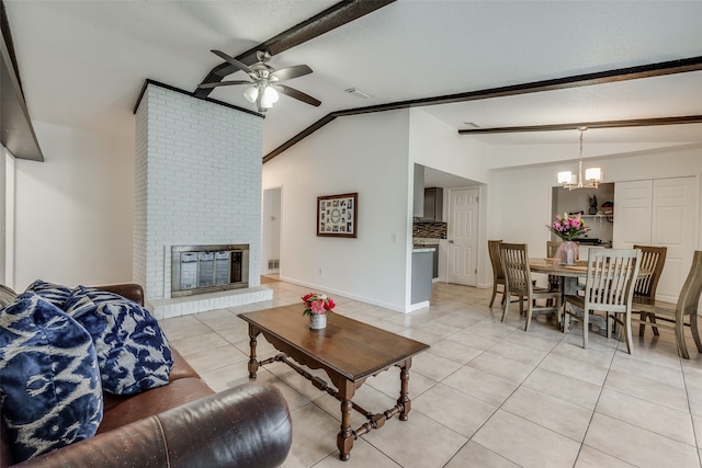 tiled living room with vaulted ceiling with beams, a textured ceiling, ceiling fan with notable chandelier, brick wall, and a fireplace