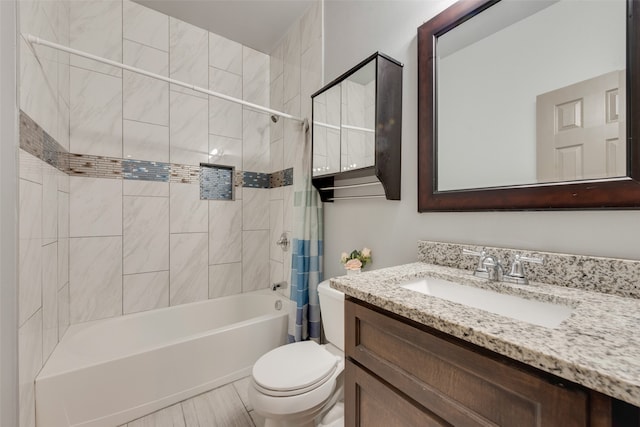 full bathroom featuring shower / tub combo with curtain, vanity, tile patterned floors, and toilet