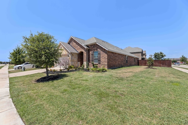 view of front of house with a front lawn