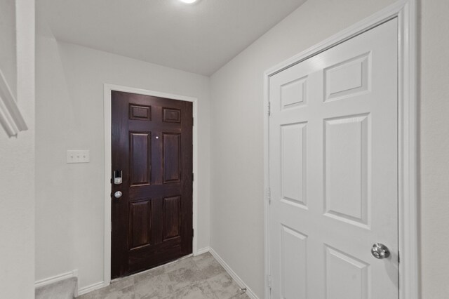 entrance foyer with light tile patterned floors