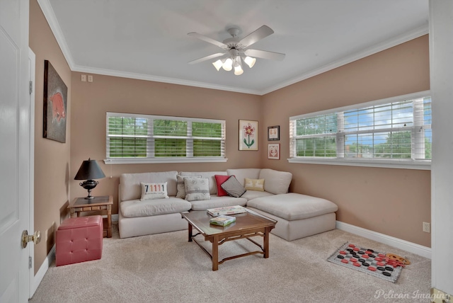 carpeted living room featuring crown molding, ceiling fan, and a wealth of natural light