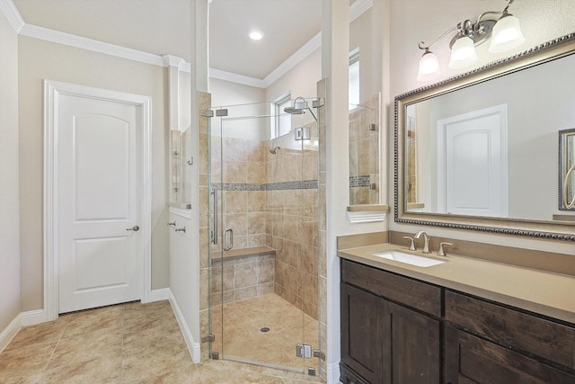 bathroom featuring vanity, an enclosed shower, and ornamental molding