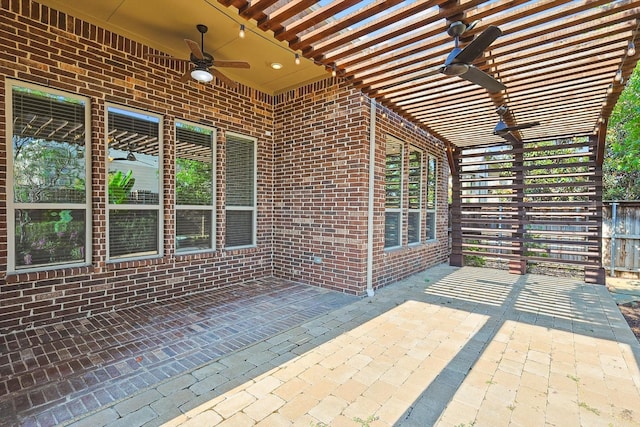 view of patio featuring ceiling fan