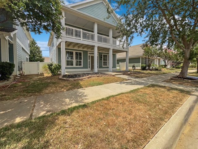 view of front of house with a balcony