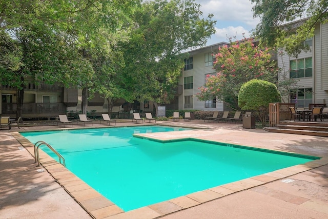 view of pool with a patio area